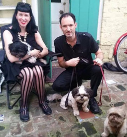 Giacomo would prefer to remain in Anne's lap, but Cody and Coco are ready for a walk.